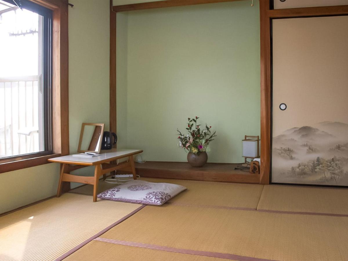 Guest Cafe Kuchikumano Hotel Kamitondacho Екстериор снимка