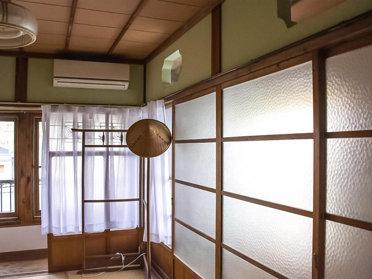 Guest Cafe Kuchikumano Hotel Kamitondacho Екстериор снимка