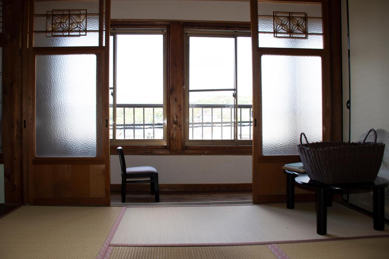 Guest Cafe Kuchikumano Hotel Kamitondacho Екстериор снимка